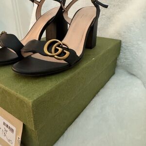 Gucci Black Heels with Gold Logo Accent